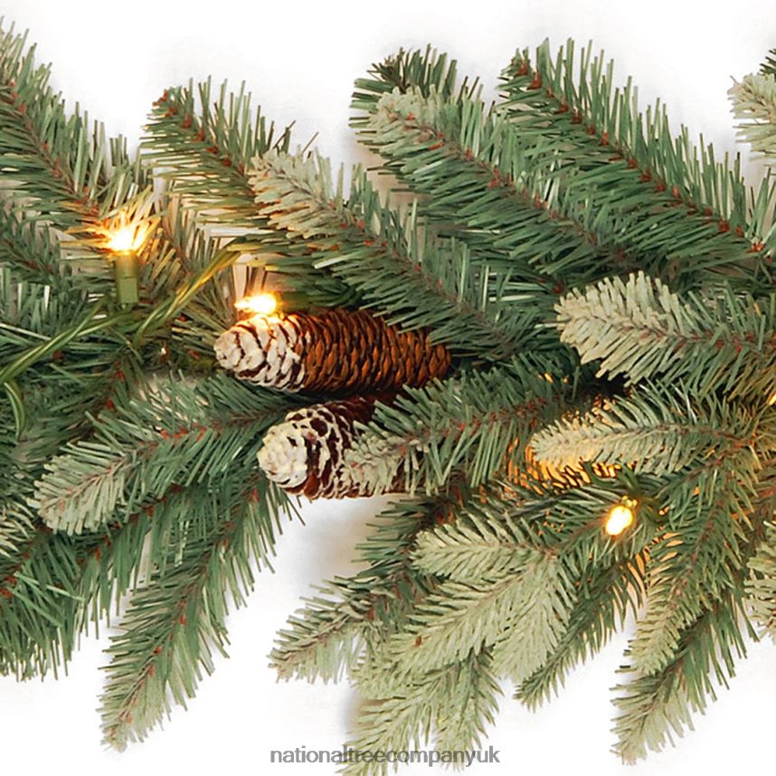 Greenery | National Tree Company Pre-Lit Artificial Christmas Garland Green Copenhagen Spruce White Lights Plug In Christmas Collection 9 Feet F2L4F381